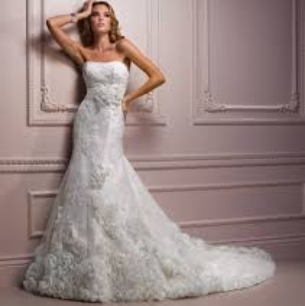 Maggie sottero wedding dress with veil and tiara